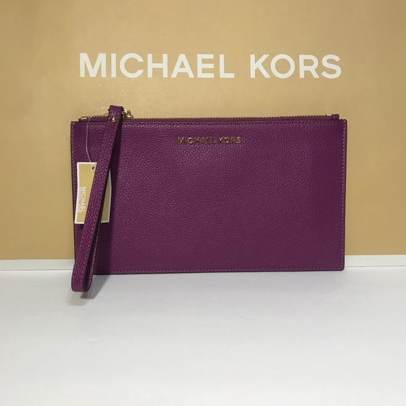 Michael Kors Handbags - Michael Kors pomegranate clutch